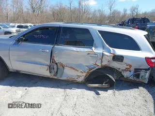 2014 Dodge Durango SXT z VIN 1C4RDJAG4EC514677, wystawiony jako IAAI lot #42059637 z przebiegiem 226 185 mil mil oraz . Historia ofert i sprzedaży dostępna na DreamBid. Obrazek 13.