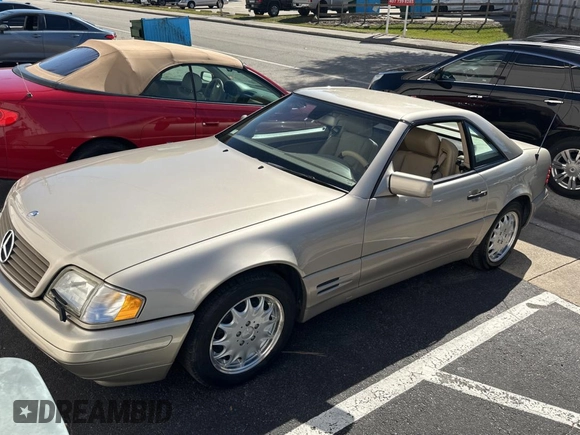1998 Mercedes-Benz SL-Class with VIN WDBFA67F4WF157541, listed as a Copart auction lot 82624554 with 102,469 mi miles and Clean Title. Bid and sale history available at carsss.com. Image 2.
