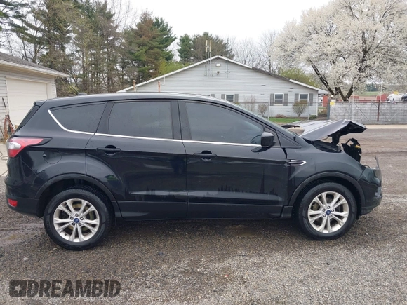2017 Ford Escape SE with VIN 1FMCU0GD3HUC86839, listed as a IAAI auction lot 42017669 with 106,228 mi miles. Bid and sale history available at carsss.com. Image 14.