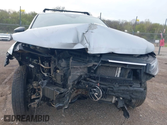 2022 Volkswagen Tiguan SE R-Line Black with VIN 3VV8B7AX7NM030703, listed as a IAAI auction lot 42135974 with 57,116 mi miles and . Bid and sale history available at DreamBid. Image 6.