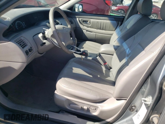 2001 Toyota Avalon XL z VIN 4T1BF28B51U184110, wystawiony jako Copart lot #52398285 z przebiegiem 127 179 mil mil oraz Szkoda całkowita • Salvage title. Historia ofert i sprzedaży dostępna na DreamBid. Obrazek 7.