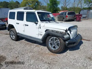 2019 Jeep Wrangler Unlimited Sahara with VIN 1C4HJXEN5KW509806, listed as a IAAI auction lot 42071325 with 95,549 mi miles and . Bid and sale history available at DreamBid. Image 1.