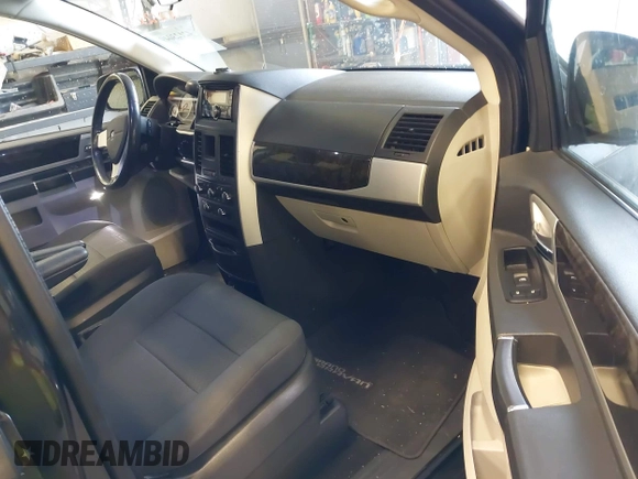 2010 Dodge Grand Caravan SXT with VIN 2D4RN5D19AR433481, listed as a IAAI auction lot 42123049 with 134,882 mi miles and . Bid and sale history available at DreamBid. Image 5.