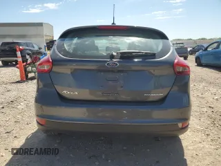 2017 Ford Focus Titanium с VIN 1FADP3N2XHL287713, выставлен на аукционе Copart как лот 57823155 с пробегом 51 828 миль миль и Списание • Salvage title. История ставок и продаж доступна на DreamBid. Изображение 6.