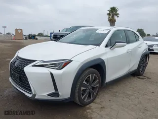 2022 Lexus UX with VIN JTHX3JBH2N2052061, listed as a IAAI auction lot 41878323 with 36,902 mi miles. Bid and sale history available at carsss.com. Image 2.