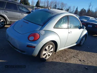 2009 Volkswagen New Beetle Coupe S with VIN 3VWPG31C39M515764, listed as a IAAI auction lot 41557507 with 90,716 mi miles. Bid and sale history available at carsss.com. Image 4.