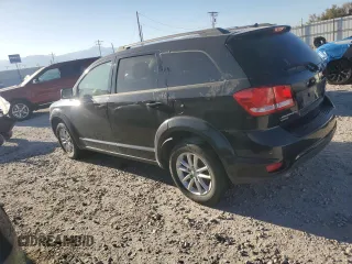 2015 Dodge Journey SXT with VIN 3C4PDDBG9FT755664, listed as a Copart auction lot 59167815 with 180,128 mi miles and Clean title. Bid and sale history available at DreamBid. Image 2.