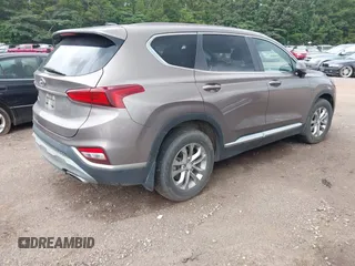 2020 Hyundai Santa Fe SE with VIN 5NMS23AD4LH142202, listed as a IAAI auction lot 42526020 with 59,964 mi miles and . Bid and sale history available at DreamBid. Image 4.