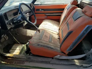 1980 Chevrolet El Camino z VIN 1W80KAD418693, wystawiony jako Copart lot #68218644 z przebiegiem Nie podano mil oraz Szkoda całkowita • Salvage title. Historia ofert i sprzedaży dostępna na DreamBid. Obrazek 7.