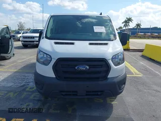2020 Ford Transit Cargo with VIN 1FTYE1Y8XLKB80973, listed as a IAAI auction lot 41707281 with 112,721 mi miles and . Bid and sale history available at DreamBid. Image 6.