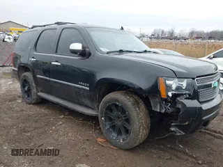 2012 Chevrolet Tahoe LTZ with VIN 1GNSKCE04CR165649, listed as a IAAI auction lot 41197285 with 208,724 mi miles and . Bid and sale history available at DreamBid. Image 1.