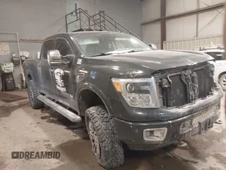 2016 Nissan Titan SL z VIN 1N6BA1F4XGN517435, wystawiony jako IAAI lot #41397502 z przebiegiem 98 455 mil mil oraz . Historia ofert i sprzedaży dostępna na DreamBid. Obrazek 1.