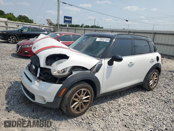 2015 MINI Countryman S with VIN WMWZC3C55FWT03267, listed as a Copart auction lot 59331605 with 116,964 mi miles and Salvage title. Bid and sale history available at DreamBid. Image 1.