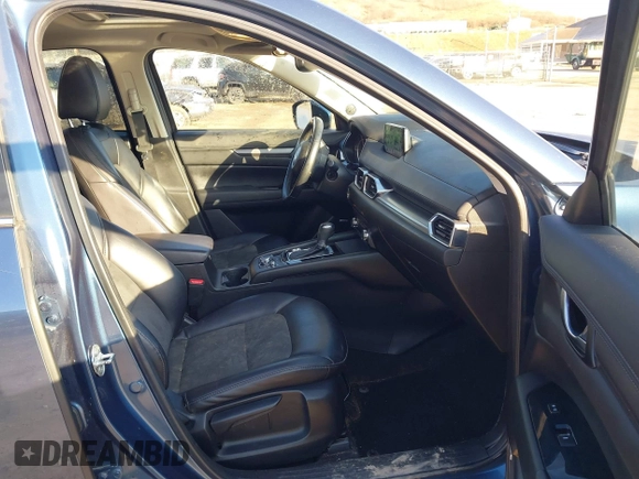 2018 Mazda CX-5 Touring z VIN JM3KFBCM2J0461954, wystawiony jako IAAI lot #41655865 z przebiegiem 129 333 mil mil oraz . Historia ofert i sprzedaży dostępna na DreamBid. Obrazek 5.
