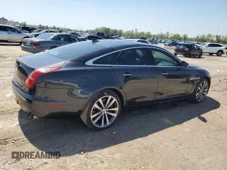2013 Jaguar XJ with VIN SAJWA3HE9DMV49768, listed as a Copart auction lot 50339955 with 56,841 mi miles and Salvage Title. Bid and sale history available at DreamBid. Image 3.