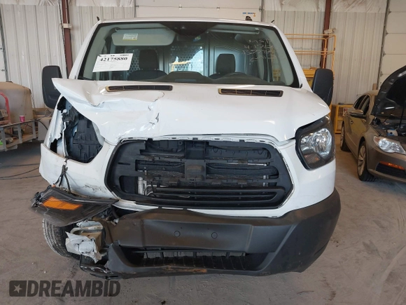 2019 Ford Transit with VIN 1FTYE1YM0KKB77849, listed as a IAAI auction lot 42175880 with 151,828 mi miles. Bid and sale history available at carsss.com. Image 6.