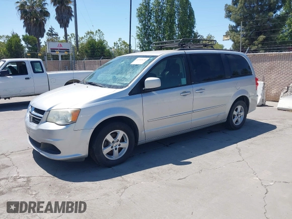 2012 Dodge Grand Caravan SXT with VIN 2C4RDGCG2CR223891, listed as a IAAI auction lot 42189650 with 119,669 mi miles and . Bid and sale history available at DreamBid. Image 2.