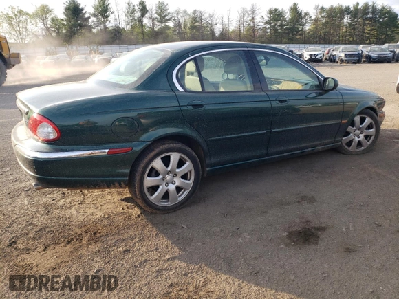 2004 Jaguar X-Type z VIN SAJEA51C04WD65097, wystawiony jako Copart lot #53825295 z przebiegiem 58 270 mil mil oraz Szkoda całkowita • Salvage title. Historia ofert i sprzedaży dostępna na DreamBid. Obrazek 3.