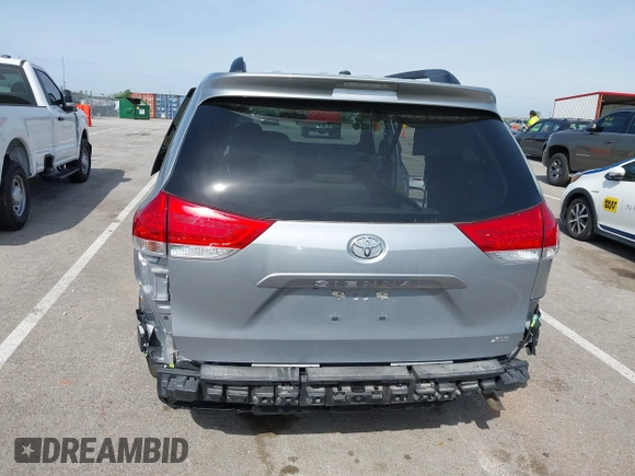 2014 Toyota Sienna XLE with VIN 5TDYK3DC0ES451307, listed as a IAAI auction lot 42093569 with 105,721 mi miles and . Bid and sale history available at DreamBid. Image 17.