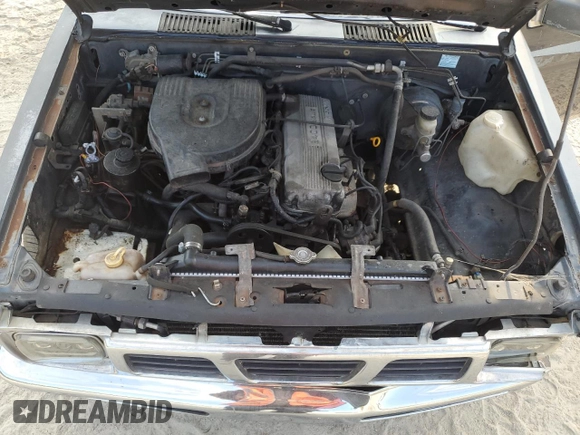 1996 Nissan Frontier XE z VIN 1N6SD16S4TC308641, wystawiony jako Copart lot #77328574 z przebiegiem Nie podano mil oraz Szkoda całkowita • Salvage title. Historia ofert i sprzedaży dostępna na DreamBid. Obrazek 11.