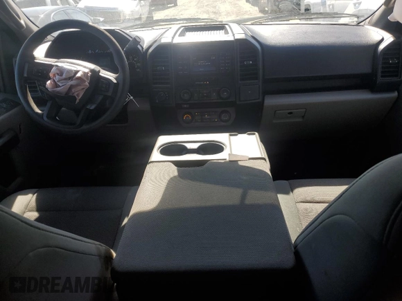2015 Ford F-150 XLT with VIN 1FTEW1EF9FKE55062, listed as a Copart auction lot 46934545 with 148,430 mi miles and Salvage title. Bid and sale history available at DreamBid. Image 8.