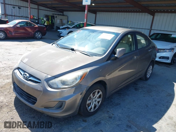 2014 Hyundai Accent GLS z VIN KMHCT4AE9EU671748, wystawiony jako IAAI lot #42356469 z przebiegiem 179 390 mil mil oraz . Historia ofert i sprzedaży dostępna na DreamBid. Obrazek 6.