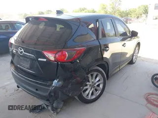 2015 Mazda CX-5 Grand Touring with VIN JM3KE4DY7F0481883, listed as a IAAI auction lot 42091709 with 184,248 mi miles and . Bid and sale history available at DreamBid. Image 6.