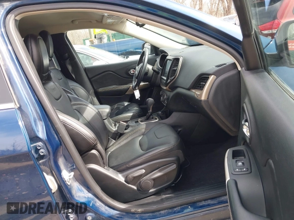 2018 Jeep Cherokee Limited with VIN 1C4PJMDB5JD562002, listed as a IAAI auction lot 41806090 with 116,706 mi miles. Bid and sale history available at carsss.com. Image 5.