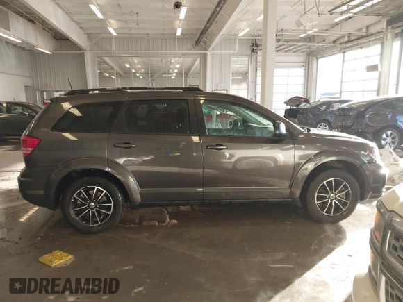 2018 Dodge Journey SE with VIN 3C4PDCAB1JT519745, listed as a IAAI auction lot 41366307 with 131,436 mi miles. Bid and sale history available at carsss.com. Image 13.