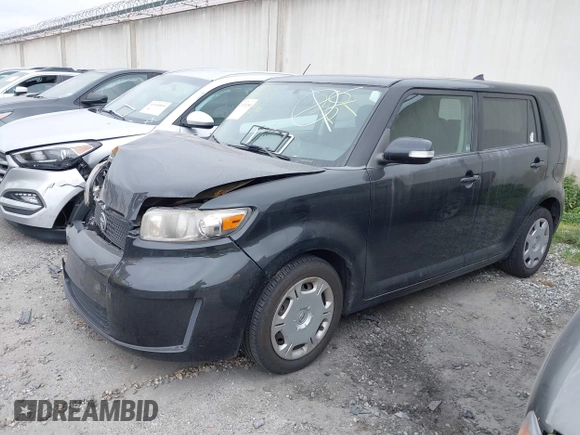 2009 Scion xB with VIN JTLKE50E291093909, listed as a IAAI auction lot 41870259 with 247,549 mi miles. Bid and sale history available at carsss.com. Image 2.