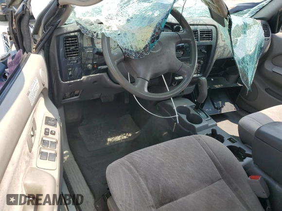 2002 Toyota Tacoma PreRunner with VIN 5TEGN92N32Z026057, listed as a Copart auction lot 59624115 with 174,835 mi miles and Salvage title. Bid and sale history available at DreamBid. Image 8.