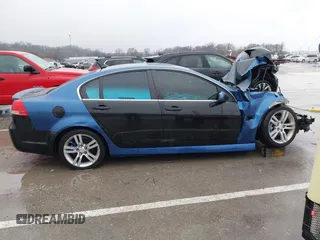 2009 Pontiac G8 with VIN 6G2ER57779L164764, listed as a IAAI auction lot 41178467 with 205,282 mi miles. Bid and sale history available at carsss.com. Image 14.