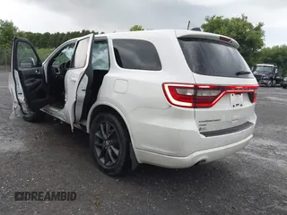2014 Dodge Durango SXT with VIN 1C4RDJAG0EC561950, listed as a IAAI auction lot 42650331 with 106,959 mi miles and . Bid and sale history available at DreamBid. Image 3.
