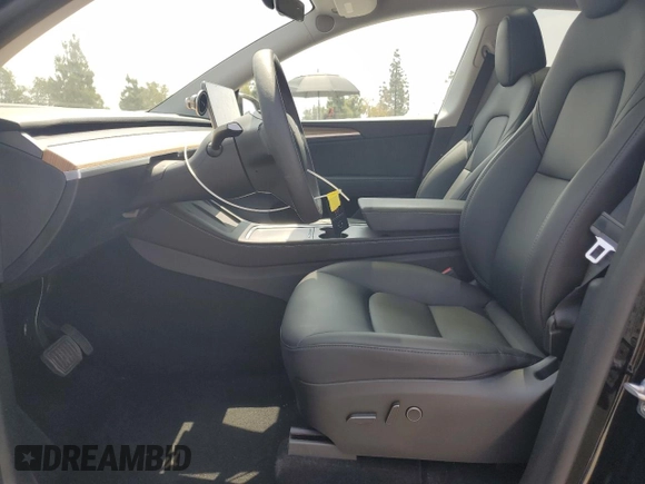 2024 Tesla Model Y Long Range with VIN 7SAYGDEE4RA228916, listed as a Copart auction lot 54921575 with 13,607 mi miles and Salvage title. Bid and sale history available at DreamBid. Image 7.