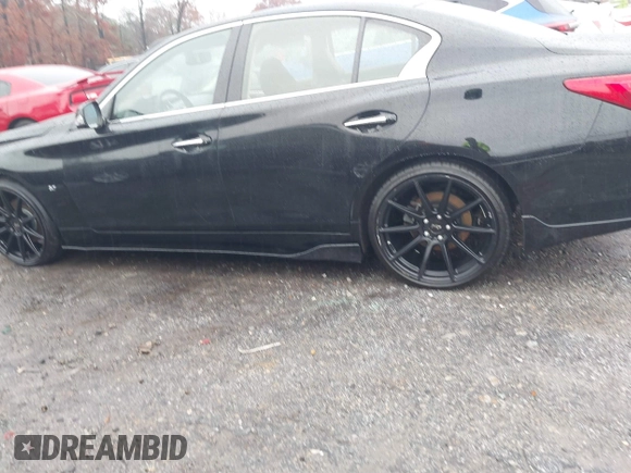 2014 Infiniti Q50 Sport with VIN JN1BV7AP4EM672256, listed as a IAAI auction lot 41016895 with 121,293 mi miles and . Bid and sale history available at DreamBid. Image 14.