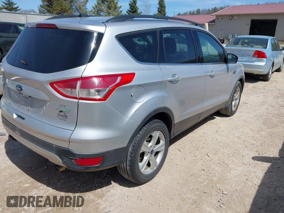 2014 Ford Escape SE with VIN 1FMCU0GX8EUC45094, listed as a IAAI auction lot 41975771 with 159,794 mi miles. Bid and sale history available at carsss.com. Image 4.