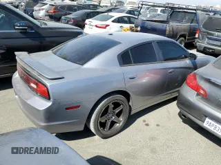 2014 Dodge Charger RT Plus with VIN 2C3CDXCT4EH307940, listed as a Copart auction lot 64035484 with 129,665 mi miles and Salvage Title. Bid and sale history available at carsss.com. Image 3.
