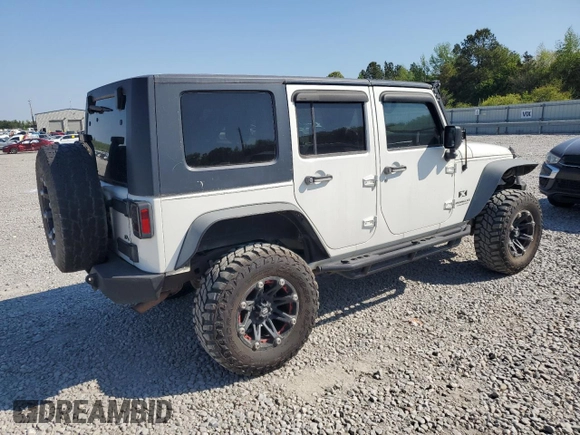 2008 Jeep Wrangler Unlimited X with VIN 1J4GB39128L576571, listed as a Copart auction lot 52706105 with 197,655 mi miles and Clean Title. Bid and sale history available at DreamBid. Image 3.
