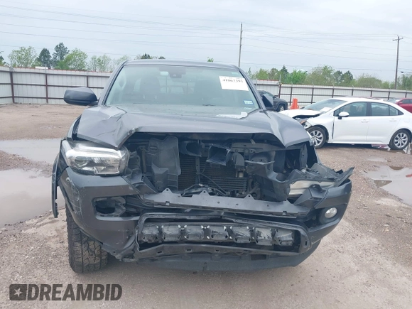 2018 Toyota Tacoma SR5 with VIN 5TFAZ5CN5JX062498, listed as a IAAI auction lot 41867393 with 128,879 mi miles and . Bid and sale history available at DreamBid. Image 13.