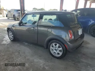 2006 MINI Hardtop with VIN WMWRC33526TK15620, listed as a Copart auction lot 54130715 with 116,981 mi miles and Salvage title. Bid and sale history available at DreamBid. Image 2.