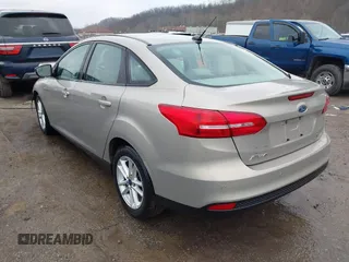 2015 Ford Focus SE with VIN 1FADP3F26FL299112, listed as a IAAI auction lot 41492446 with 57,103 mi miles. Bid and sale history available at carsss.com. Image 3.