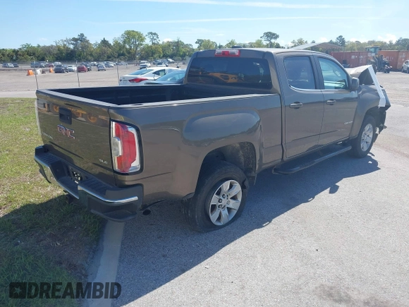 2015 GMC Canyon 2WD SLE with VIN 1GTG5BE31F1166383, listed as a IAAI auction lot 41640378 with 334,016 mi miles. Bid and sale history available at carsss.com. Image 4.