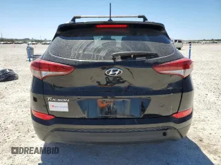 2017 Hyundai Tucson SE with VIN KM8J33A40HU409713, listed as a Copart auction lot 50105805 with 100,463 mi miles and Salvage Title. Bid and sale history available at DreamBid. Image 6.