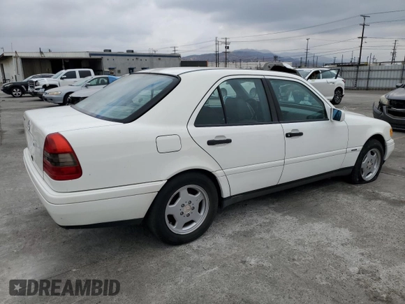 1997 Mercedes-Benz C with VIN WDBHA28E3VF582237, listed as a Copart auction lot 76826534 with 240,702 mi miles and Clean Title. Bid and sale history available at carsss.com. Image 3.