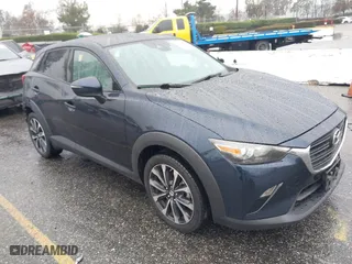 2019 Mazda CX-3 Touring with VIN JM1DKDC79K0424436, listed as a IAAI auction lot 41579280 with 76,989 mi miles. Bid and sale history available at carsss.com. Image 1.
