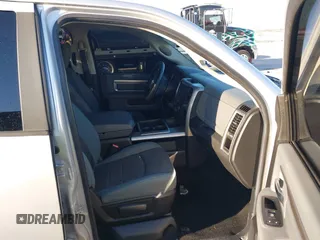2014 Ram 1500 Big Horn with VIN 1C6RR6LT1ES180291, listed as a IAAI auction lot 40962366 with 131,763 mi miles and . Bid and sale history available at DreamBid. Image 5.