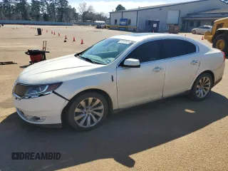 2013 Lincoln MKS with VIN 1LNHL9DK3DG618772, listed as a Copart auction lot 47287875 with 136,515 mi miles and Salvage title. Bid and sale history available at DreamBid. Image 1.