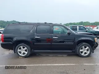 2007 Chevrolet Suburban LTZ with VIN 1GNFK16367J196596, listed as a IAAI auction lot 42392224 with 100,774 mi miles and . Bid and sale history available at DreamBid. Image 13.