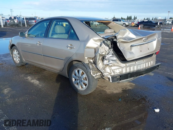 2004 Toyota Camry LE with VIN 4T1BF30K24U577908, listed as a IAAI auction lot 41591147 with 151,678 mi miles and . Bid and sale history available at DreamBid. Image 3.