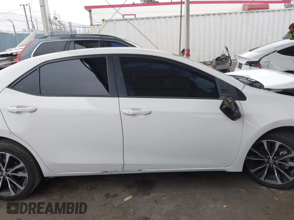 2019 Toyota Corolla L with VIN 5YFBURHE7KP862111, listed as a IAAI auction lot 42205368 with 96,823 mi miles and . Bid and sale history available at DreamBid. Image 14.